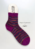 Knitted sock with multicolor pattern on a white background, featuring the brand 'Alegria Superpool'.