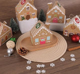 Decorative gingerbread houses on a wooden surface with Christmas decorations.