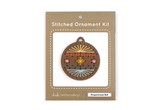 Wooden ornament shape with holes embroidery thread in paper package