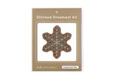 Wooden snowflake shape with holes embroidery thread in paper package