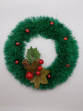 Green tinsel wreath with red bells - 9"diameter