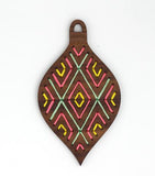 Wooden ornament with holes embroidery thread