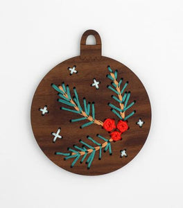 Wooden stitched ornament kit with instructions, embroidery floss